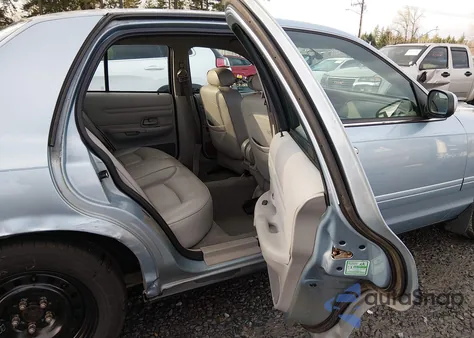 2002 Ford Crown Victoria Lx z USA, uszkodzony, nr VIN 2FAFP74W72X109773